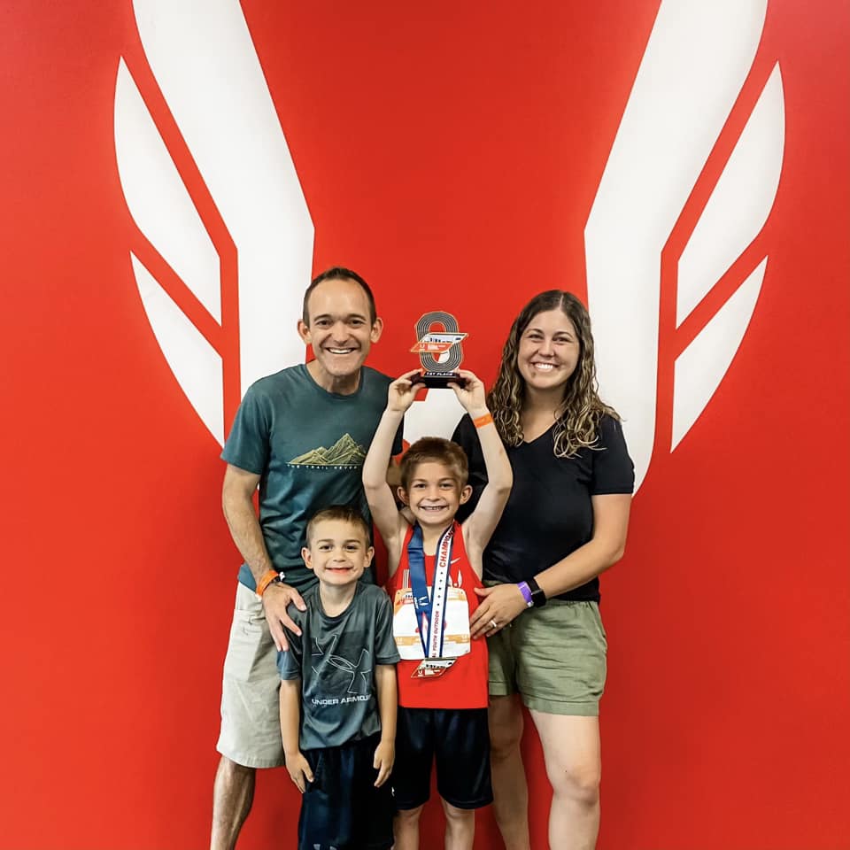 noah and family usatf champ.jpg
