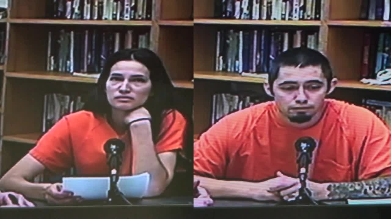 2 people accused of smuggling drugs into jail using postage stamps