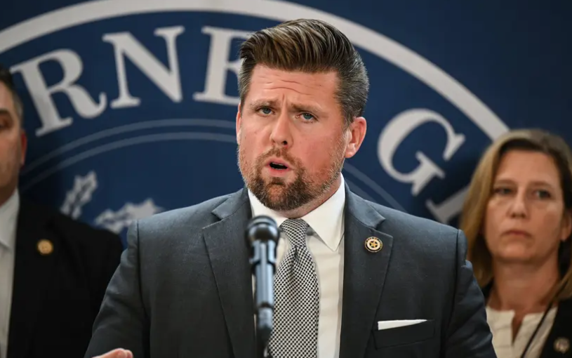 First Assistant Attorney General Brent Webster speaks during a press conference in Austin on June 9, 2022.