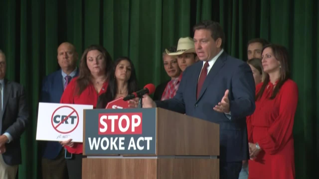 Gov. Ron DeSantis stands in front of 'Stop WOKE Act' podium in Wildwood, Dec. 15, 2021