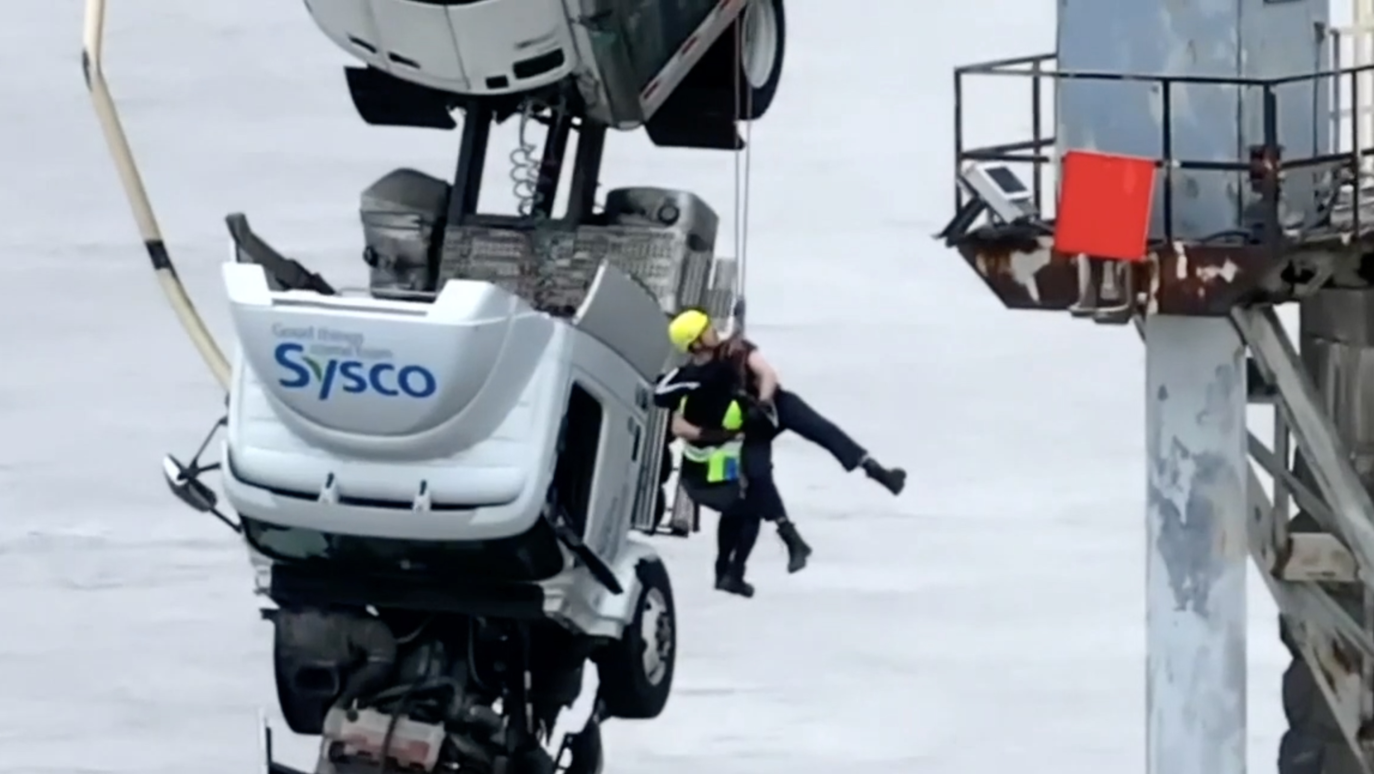 Semi dangling off bridge