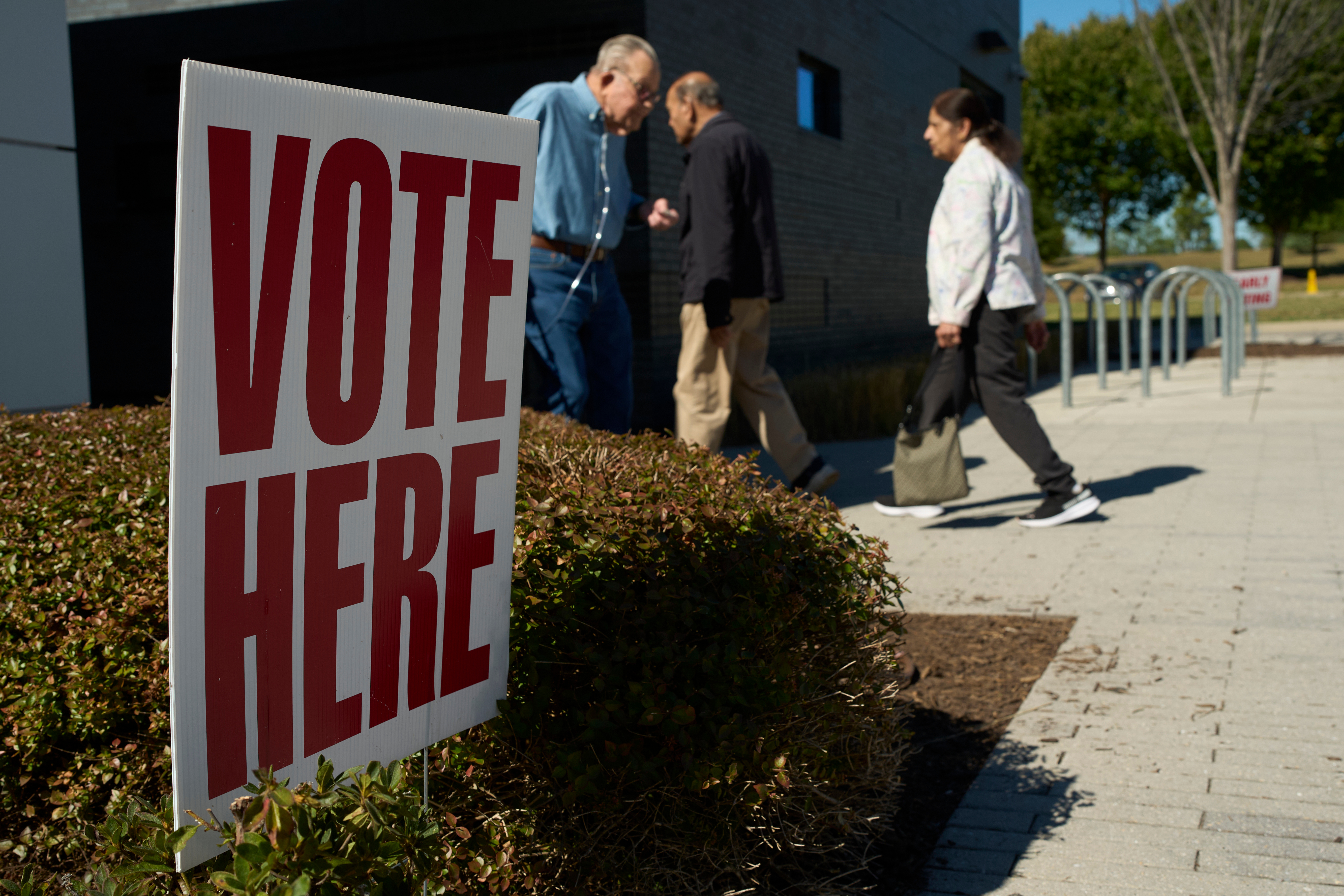 People visit an early voting polling place Friday, Oct. 23, 2026, in Nashville, Tenn.