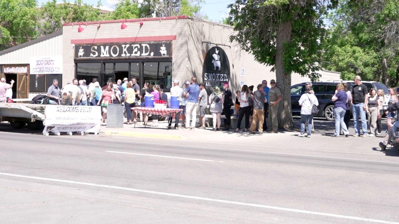 Huge crowd shows up at Smoked BBQ to defy PETA