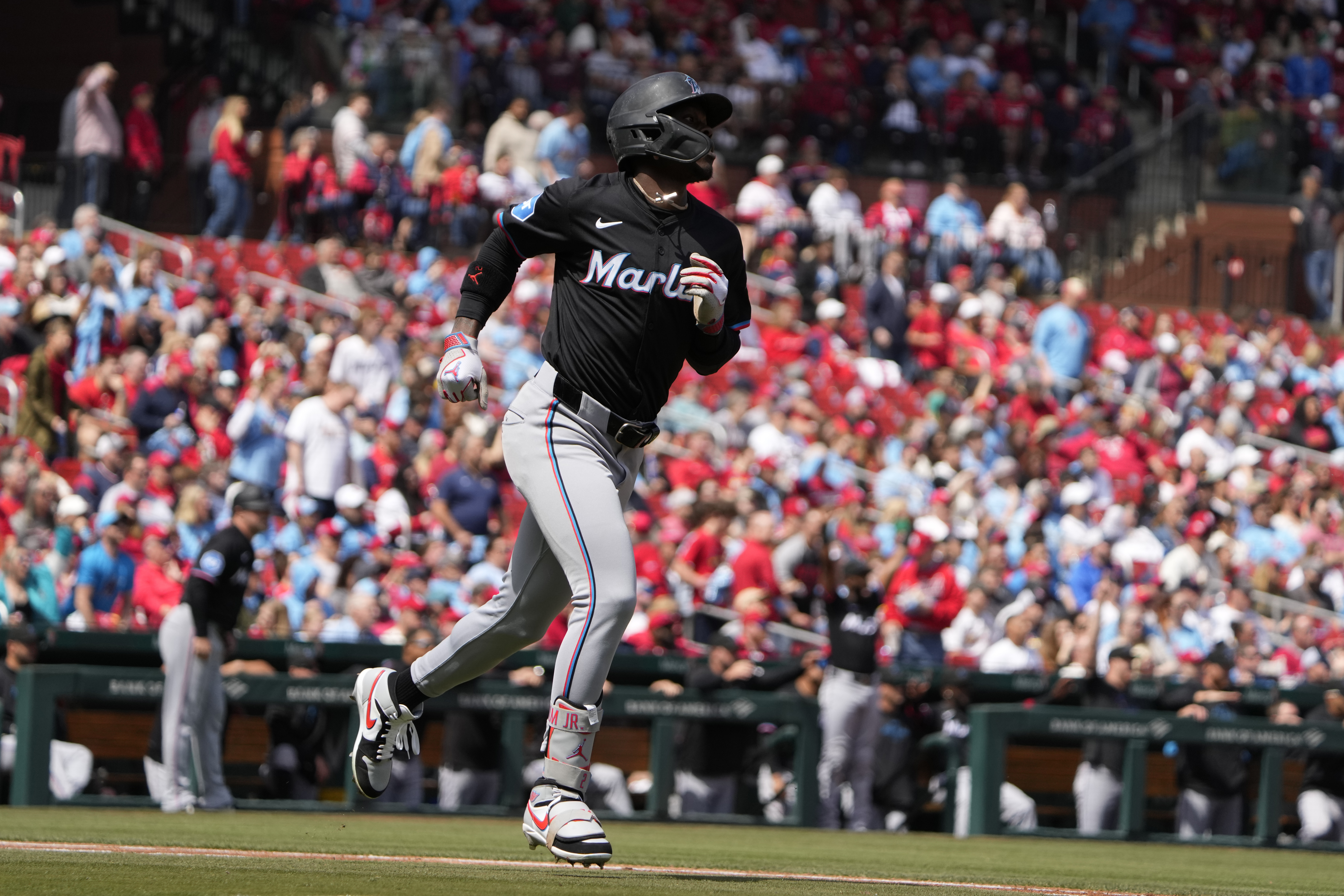 Miami Marlins slugger Jazz Chisholm Jr. rounds bases after 3-run home run in first inning at St. Louis Cardinals, April 7, 2024