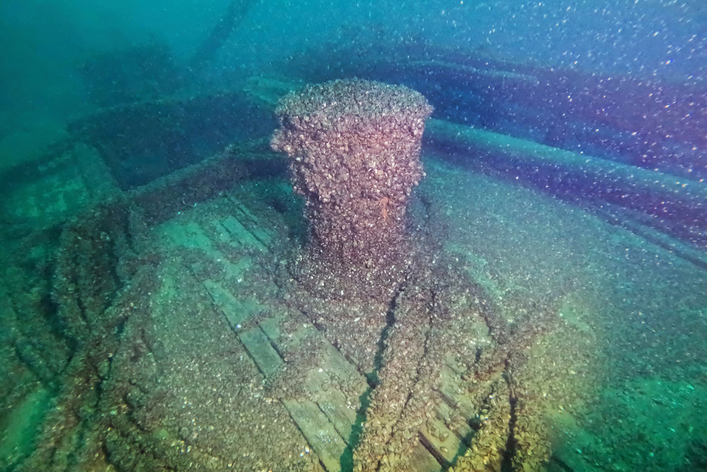 In this photo released by the Wisconsin Historical Society, quagga mussels cover the capstan of the F.J. King shipwreck in Lake Michigan on Aug. 23, 2025. 