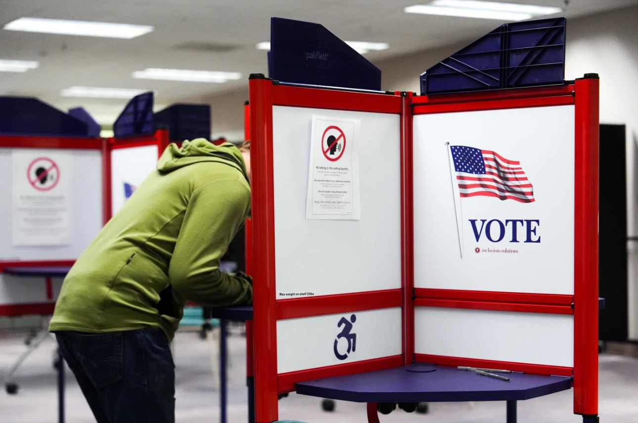 A person votes early in the Virginia redistricting referendum at the Fairfax County Government Center, Friday, April 3, 2026, in Fairfax, Va.