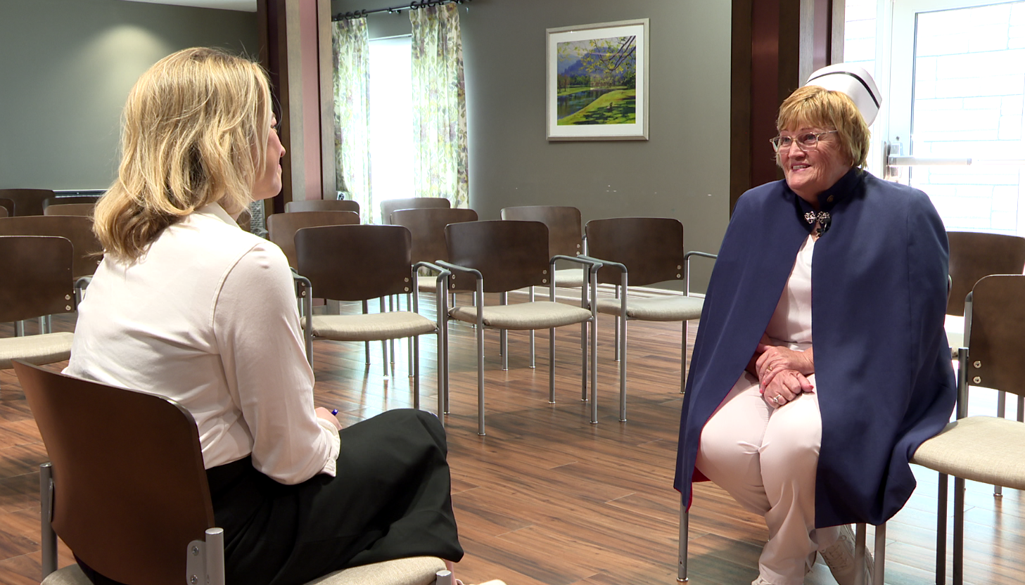 Deb Zobel, Nebraska Nurse Honor Guard founder, speaks to 3 News Now's Mary Nelson prior to a living tribute ceremony.