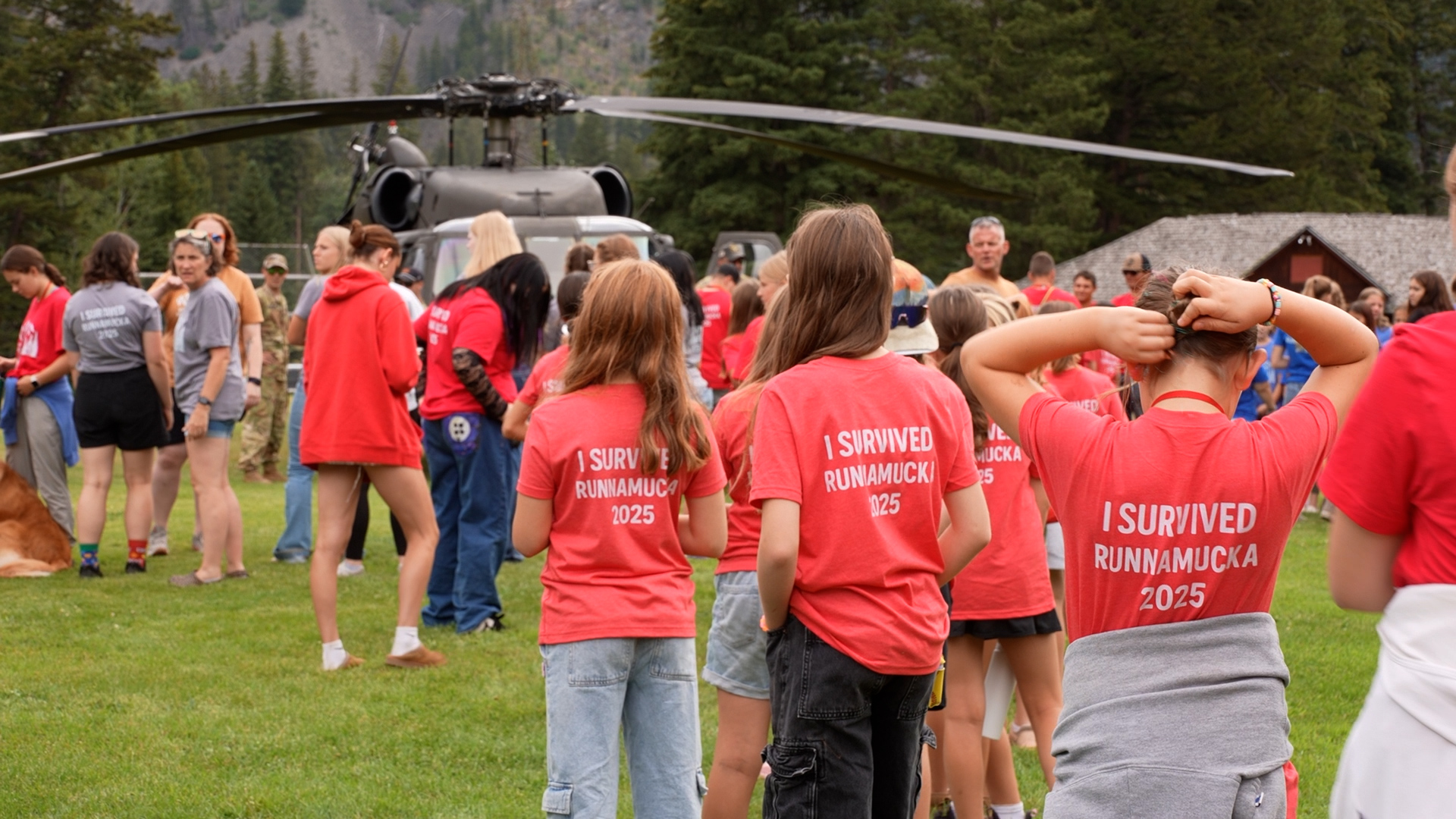 Kids walking towards Black Hawk 