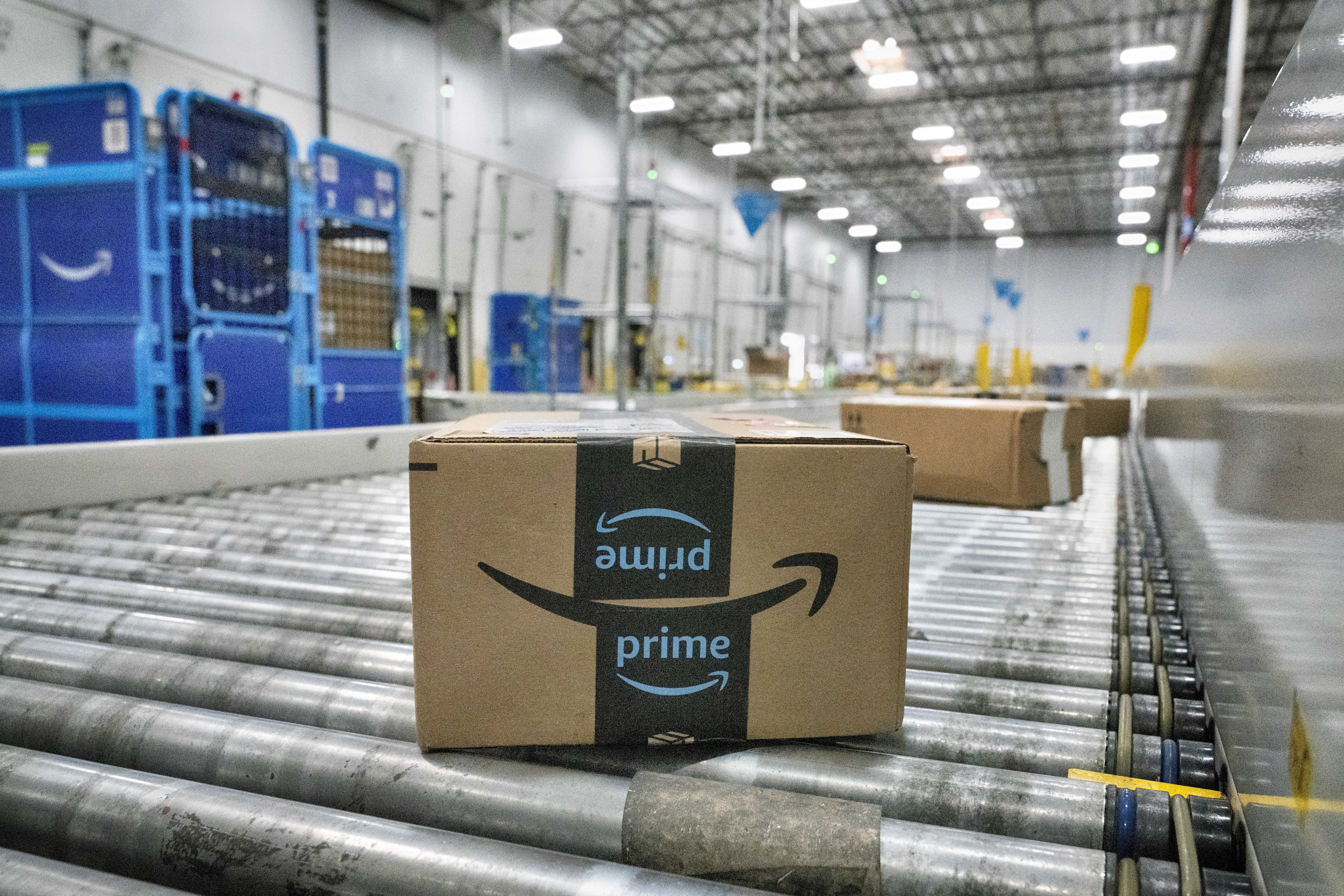 FILE - A package moves along a conveyor belt at an Amazon's DAX7 delivery station during Amazon's annual Prime Day event, Tuesday, July 16, 2024, in South Gate, Calif.