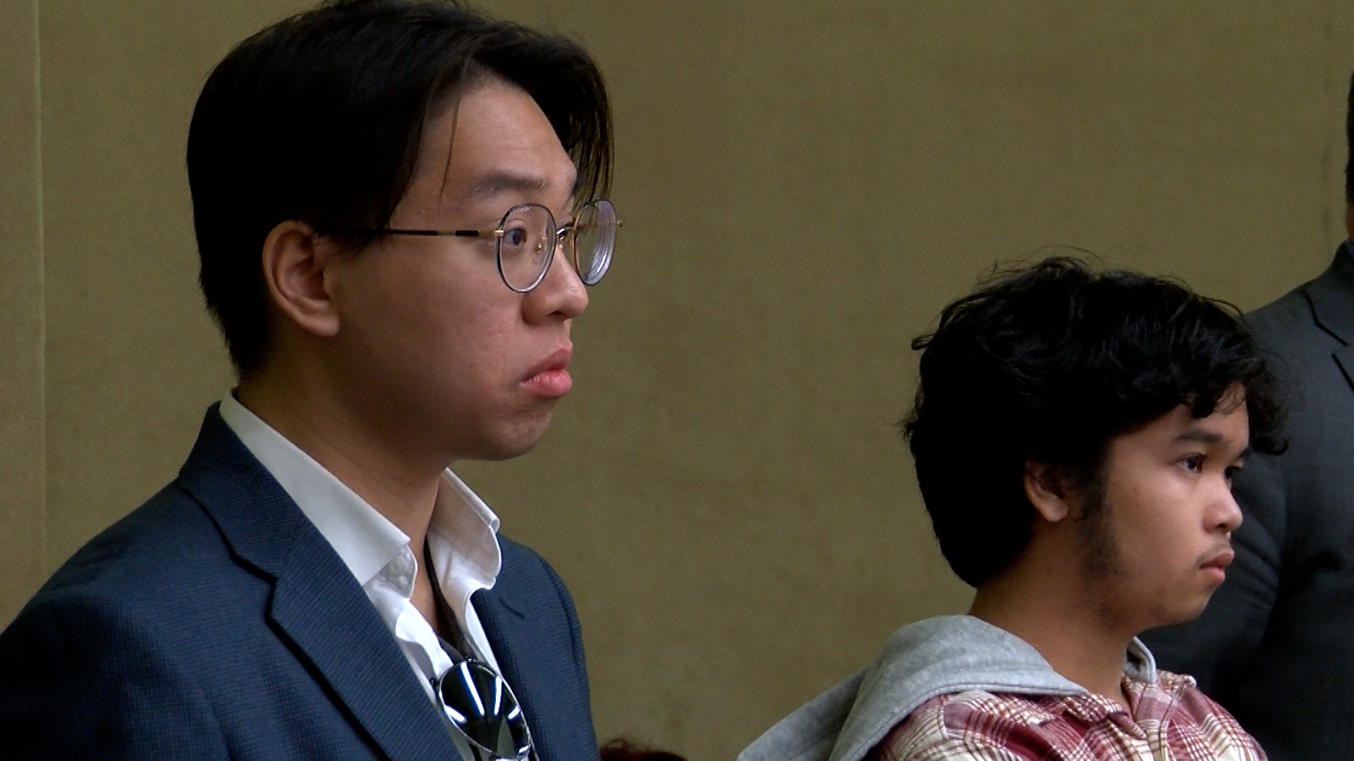 Two Cal Poly students made their first court appearance Tuesday following their arrests last month.