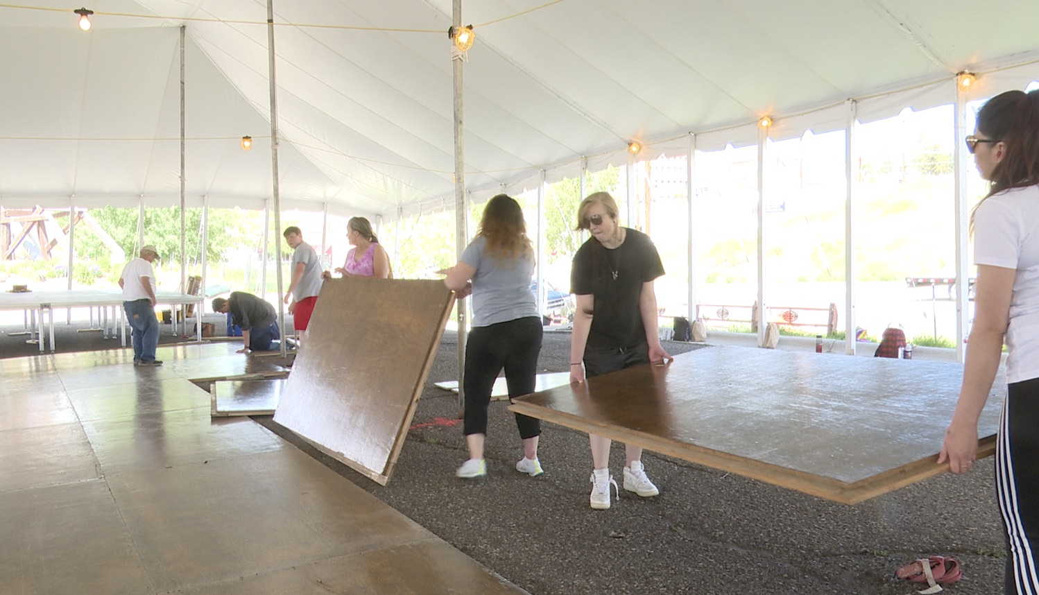 Volunteers busy setting up for the Montana Folk Festival in Butte - Vimarsana News