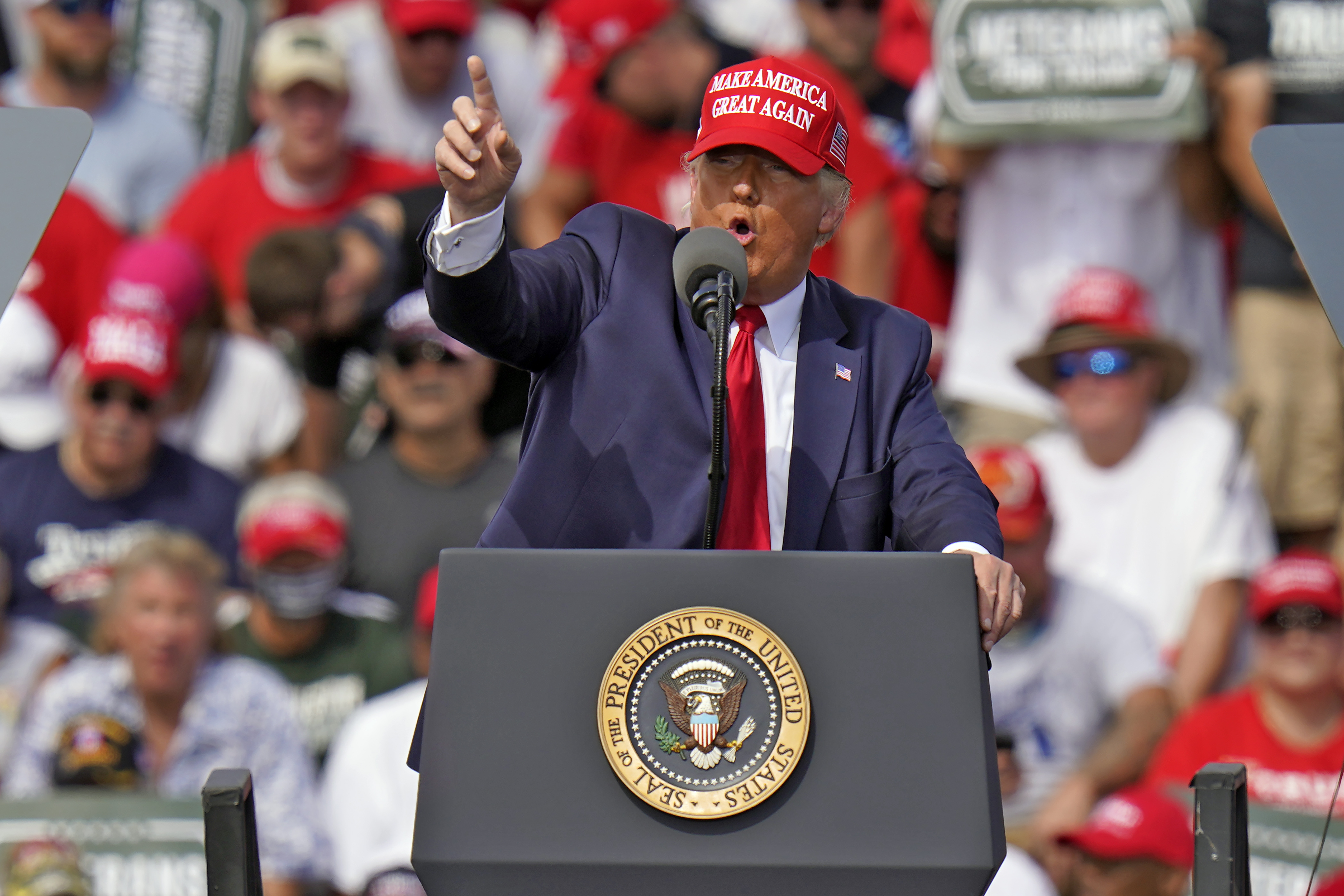 President Donald Trump gestures to crowd at campaign rally in Tampa, Oct. 29, 2020