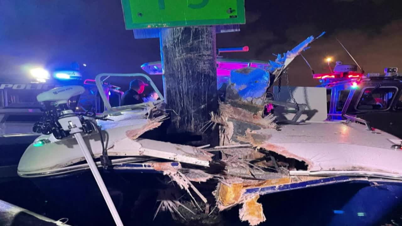 Two people were hospitalized after a boat crash in Miami Friday night.