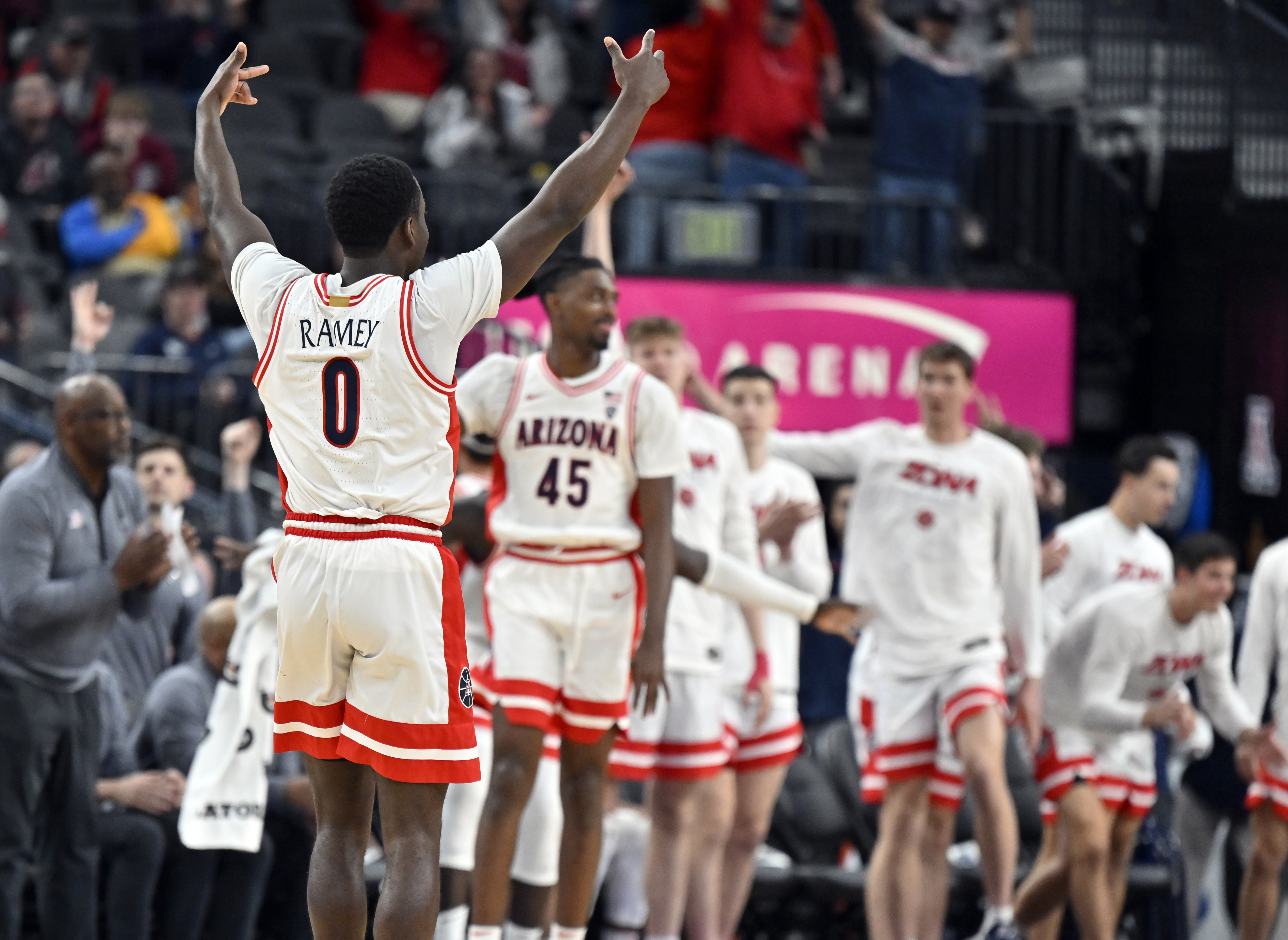 Arizona guard Courtney Ramey (0) reacts after a 3-point basket against Stanford during the second half of an NCAA college basketball game in the quarterfinals of the Pac-12 men's tournament Thursday, March 9, 2023, in Las Vegas. (AP Photo/David Becker)


