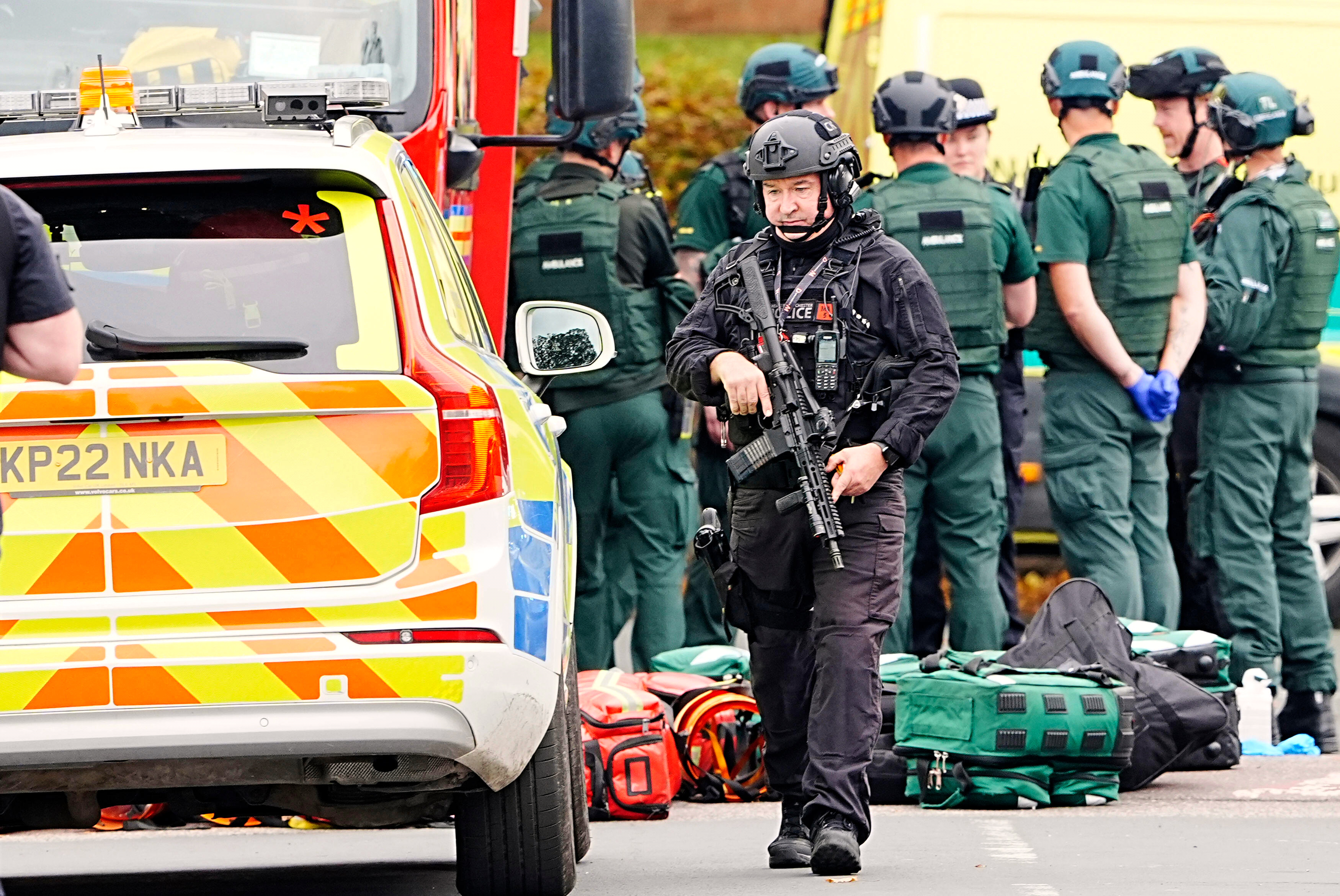 An armed police officer at the scene of a stabbing incident at Heaton Park Hebrew Congregation synagogue, in Crumpsall, Manchester, England, Thursday Oct. 2, 2025. 