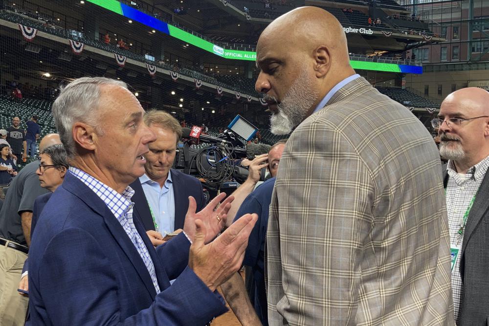 Baseball Commissioner Rob Manfred and Major League Baseball Players Association executive director Tony Clark