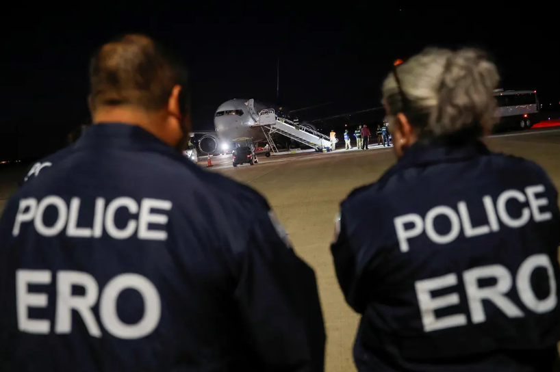 Congress and the president are pushing for more border and immigration enforcement. U.S. Enforcement and Removal Operations officers near an aircraft on which migrants are repatriated as part of an enforcement process, in Harlingen in 2023.