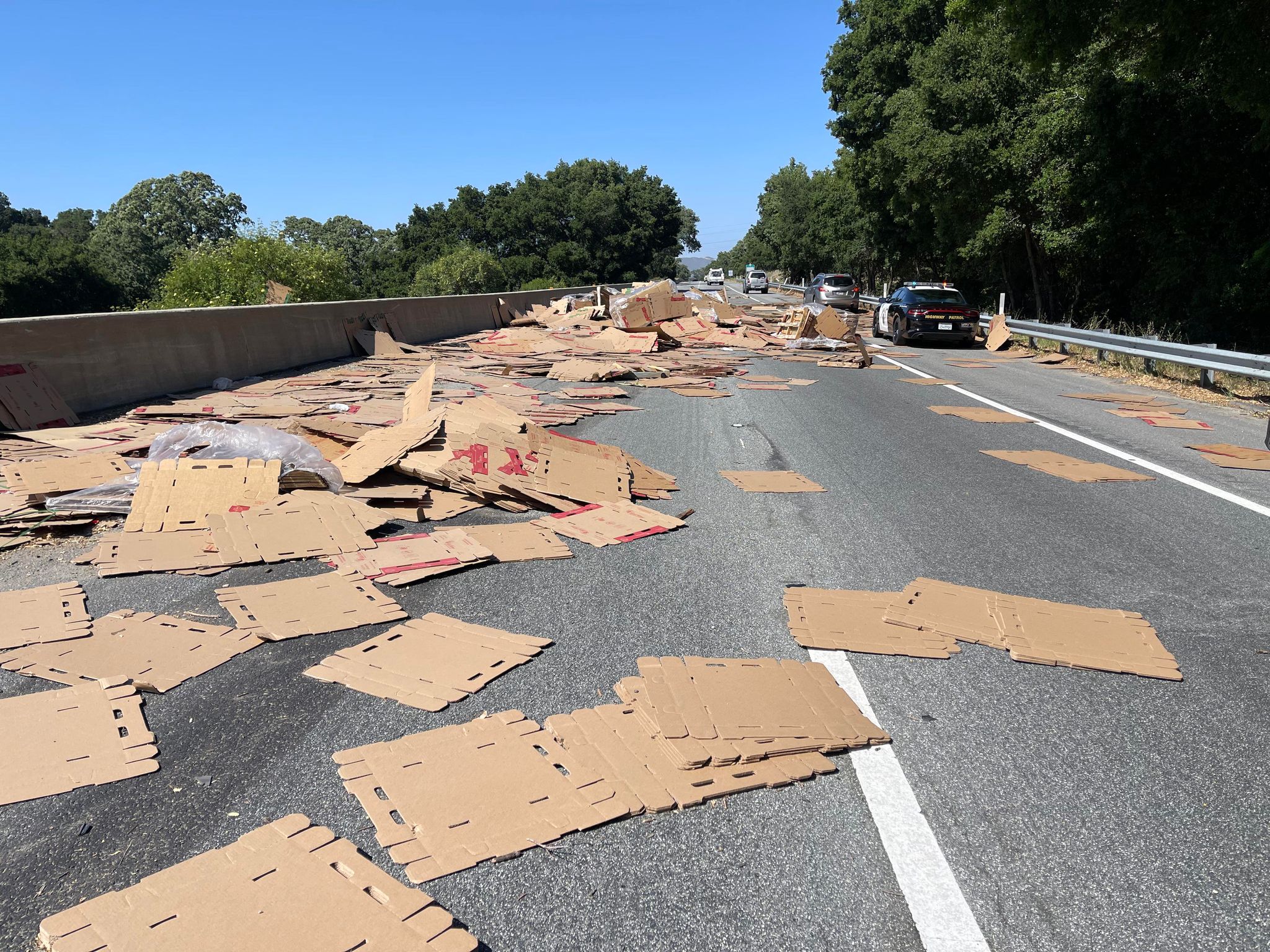 chp officers pick cardboard boxes.jpg