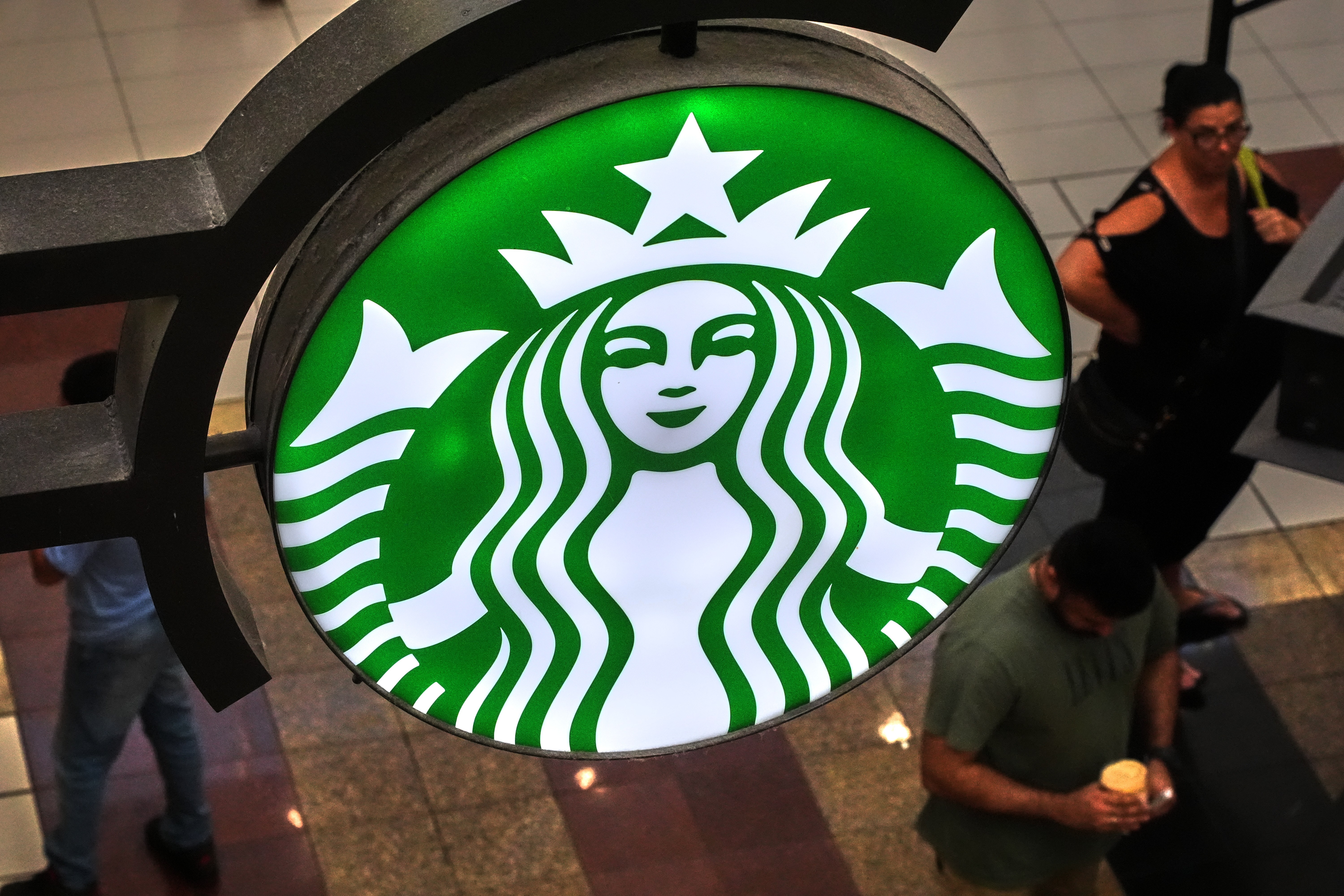 FILE - A Starbucks sign is displayed in the Galleria Mall in Buffalo, N.Y., Wednesday, Aug. 26, 2026.