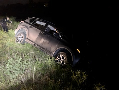 Car nearly in canal in St. Lucie County on June 9, 2023.jpeg