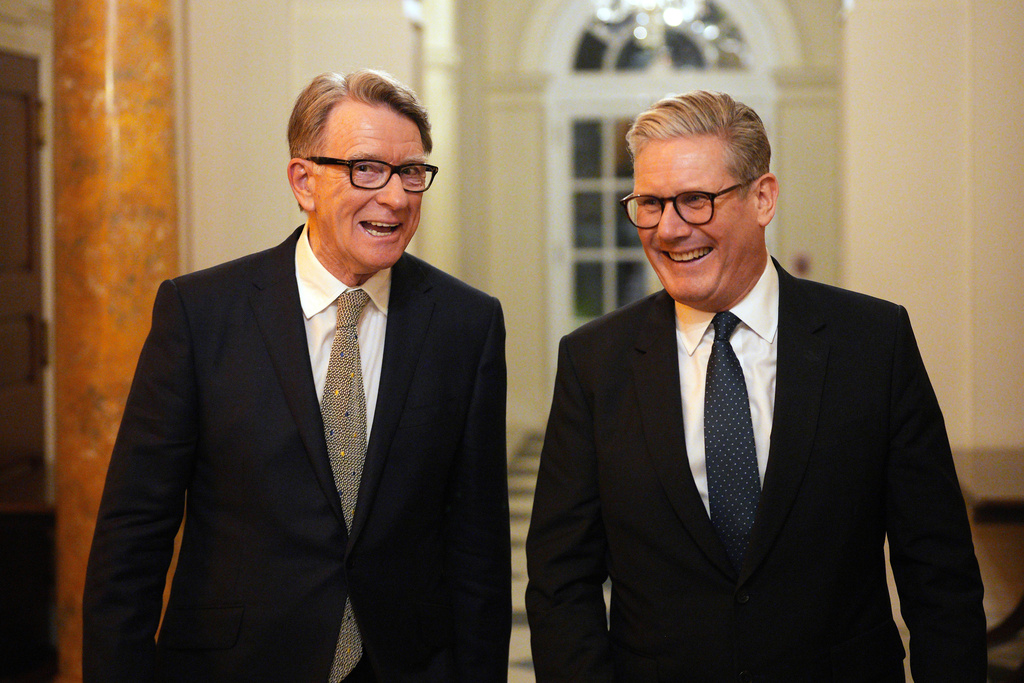 British Prime Minister Keir Starmer, right, talks with Britain's ambassador to the United States Peter Mandelson.