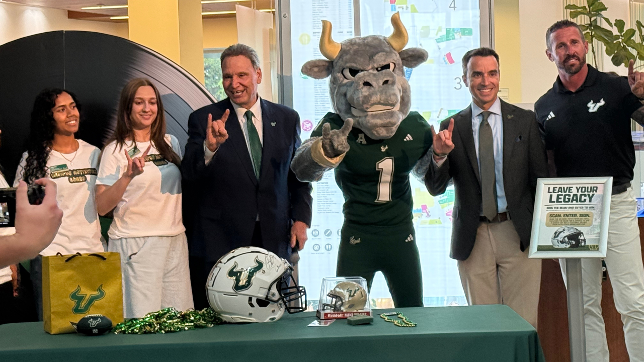 Students at USF invited to sign beam used for the construction of a new on-campus football stadium 