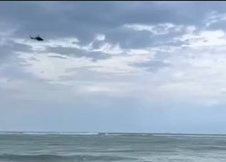Helicopter was involved in rescue of three people on boat that overturned near the Jupiter Inlet. Sept. 16, 2023.jpg