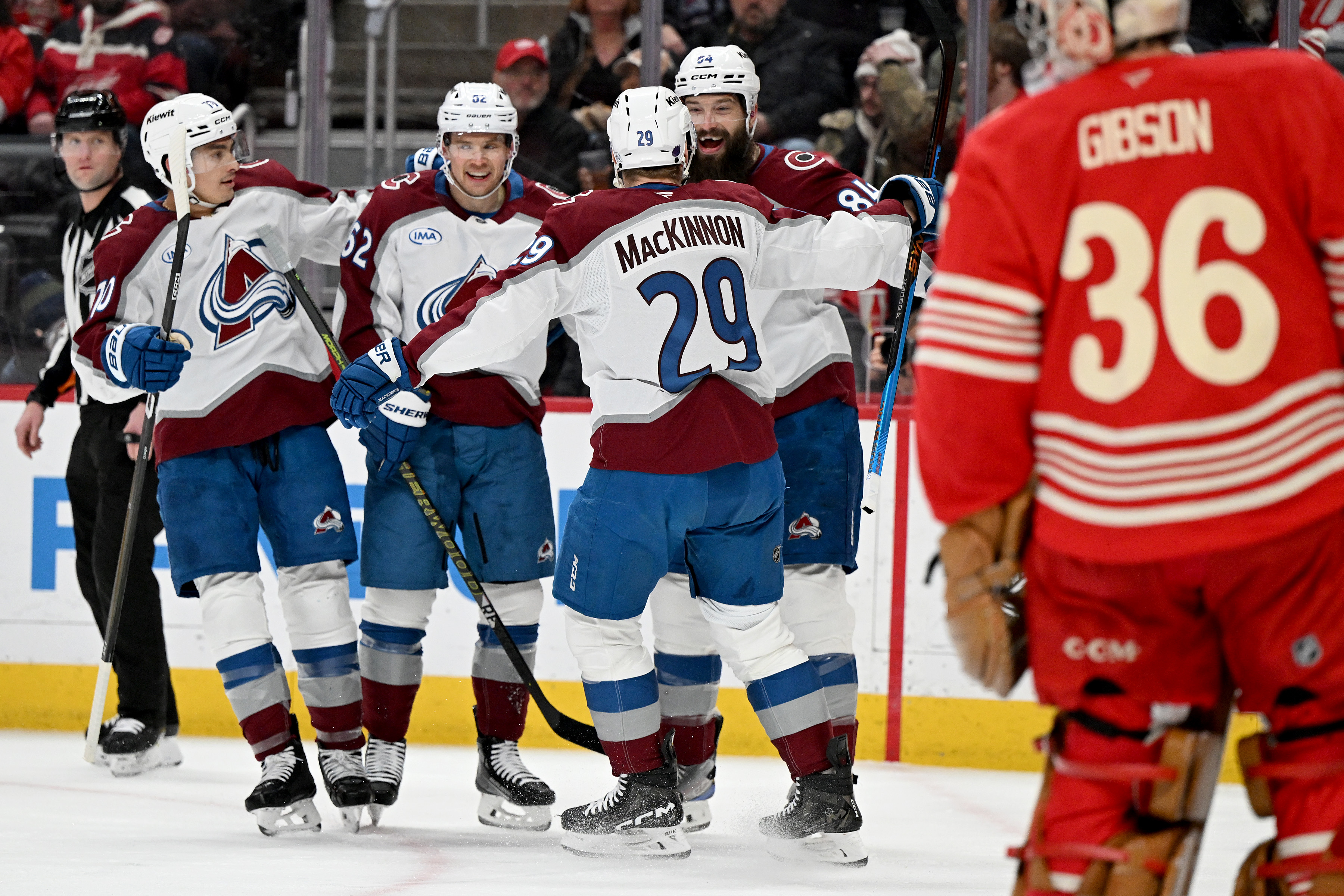 Colorado defenseman Brent Burns (84), Colorado defenseman Sam Malinski (70), Colorado left wing Artturi Lehkonen (62), Colorado center Nathan MacKinnon (29)