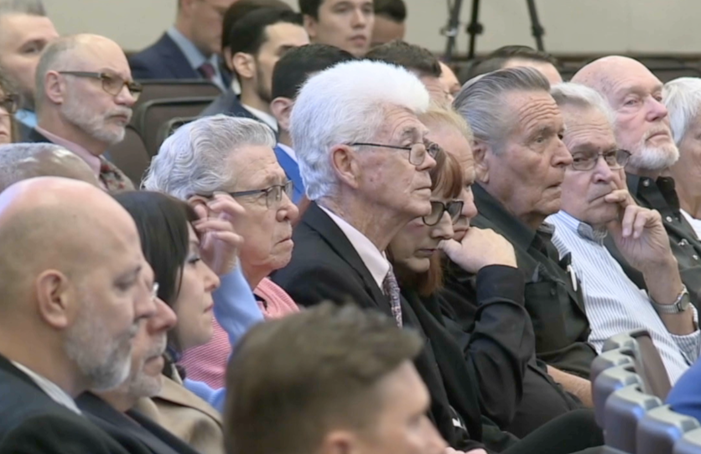 White House Boys Group of survivors at a legislative committee meeting in 2024.png