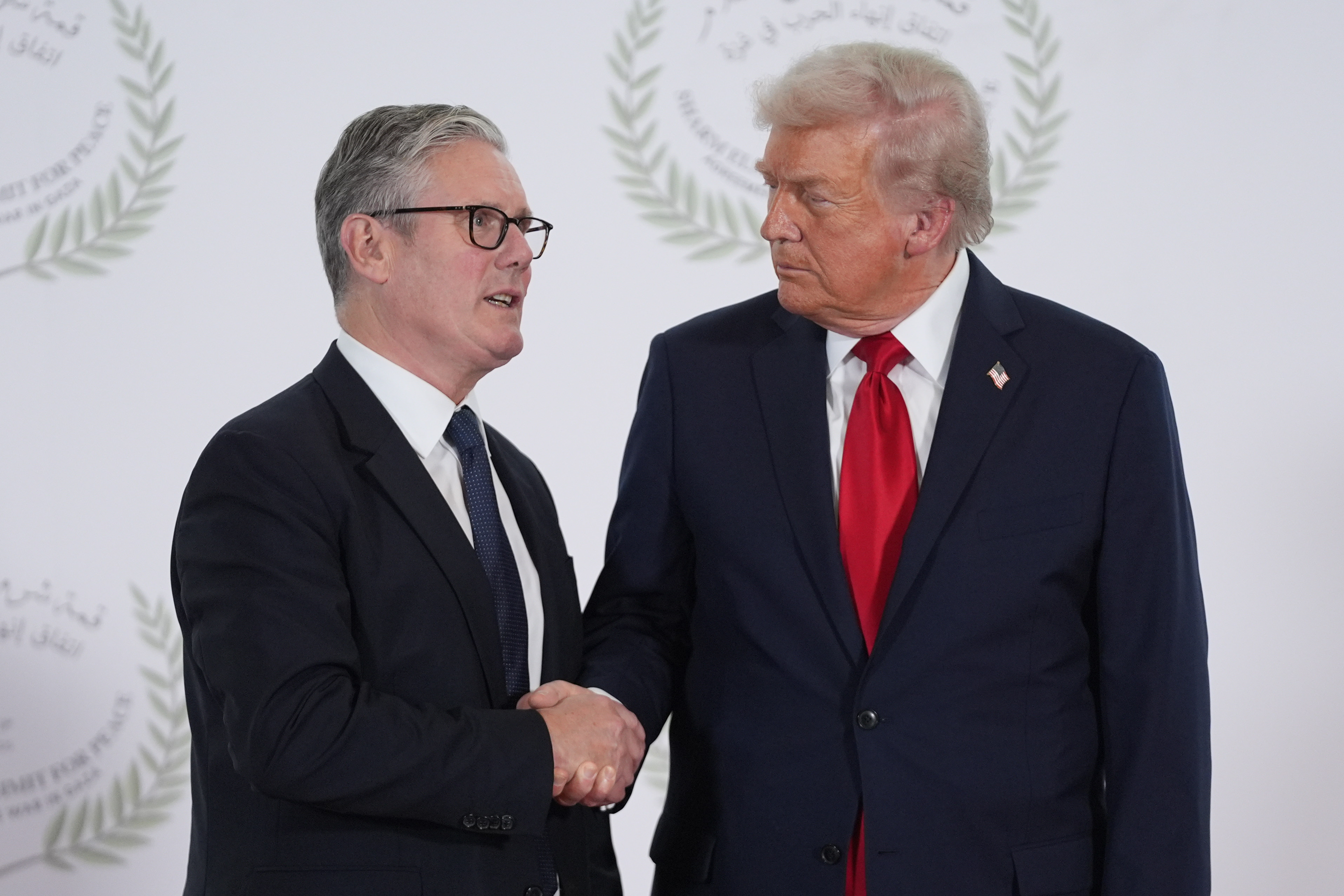 President Donald Trump greets Britain's Prime Minister Keir Starmer during summit to support ending the more than two-year Israel-Hamas war in Gaza after a breakthrough ceasefire deal, Monday, Oct. 13, 2025, in Sharm El Sheikh, Egypt.