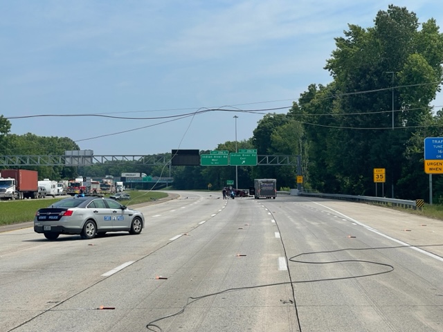 Downed power lines cause crash, lane closures on I-64