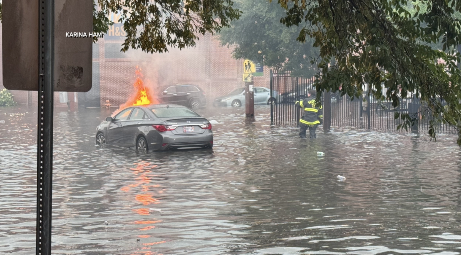Car catches fire during fells point flooding