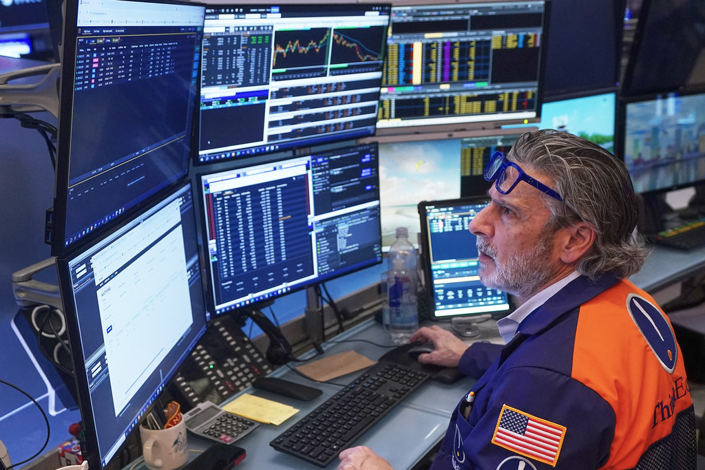 Trader John Romolo works on the floor of the New York Stock Exchange, Friday, Feb. 20, 2026. 