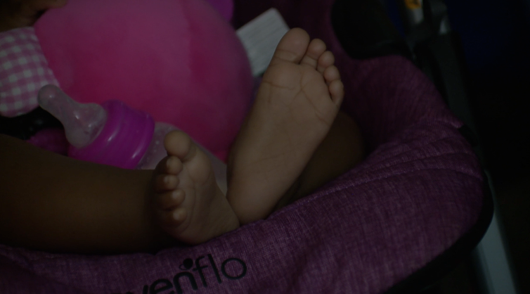Feet of baby living in hotel