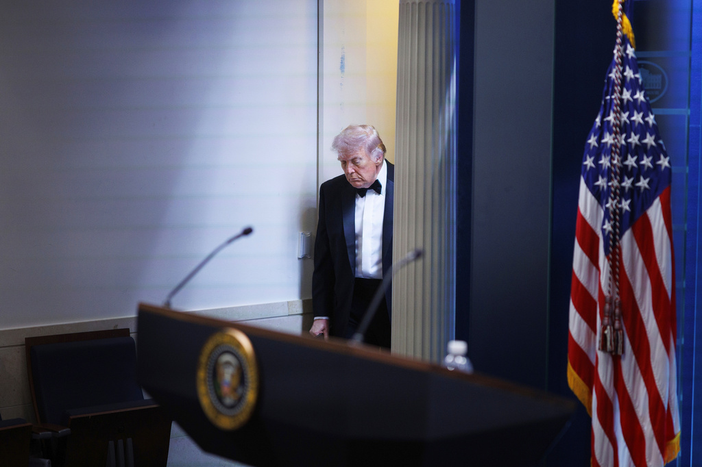 President Donald Trump arrives at the James Brady Press Briefing Room at the White House after a shooting incident outside the ballroom at the annual White House Correspondents' Association Dinner in Washington, Saturday, April 25, 2026.
