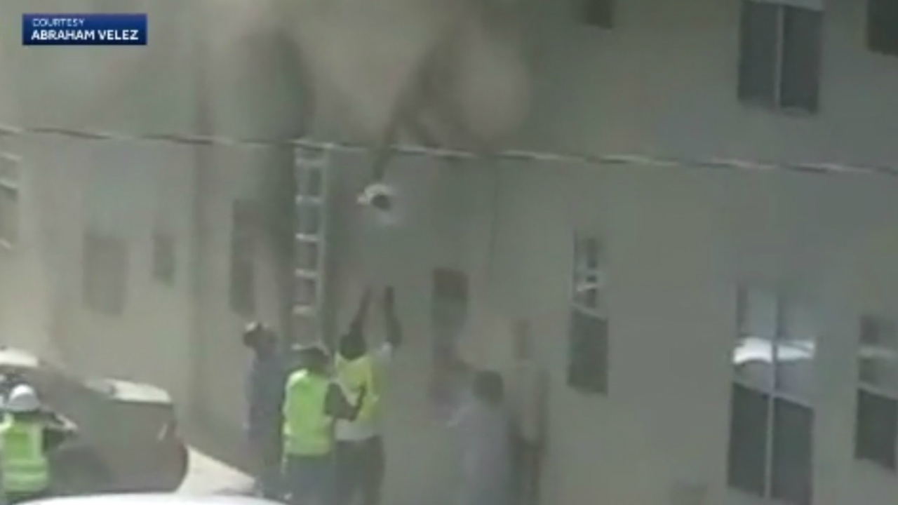 A New Mexico man rescues baby and toddle from burning building