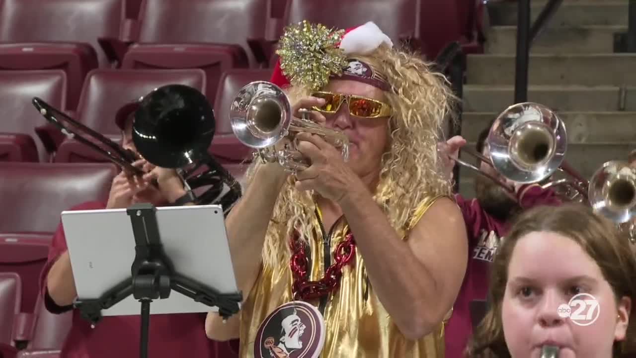 Marching Chiefs alumni fill out band section at Florida State basketball games during winter break