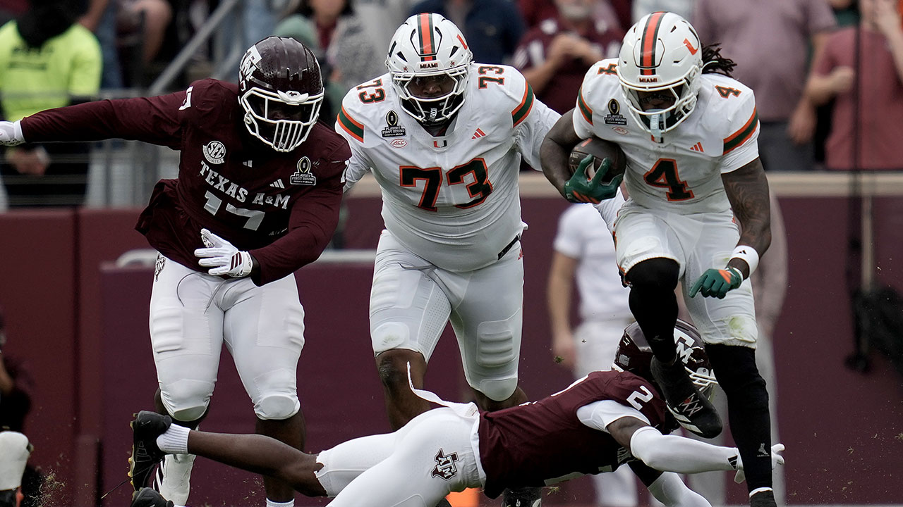 Miami running back Mark Fletcher Jr. (4) steps out of a tackle attempt by Texas A&M cornerback Dezz Ricks (2) during the second quarter in the first round of the NCAA College Football Playoff Saturday, Dec. 20, 2025, in College Station, Texas. 