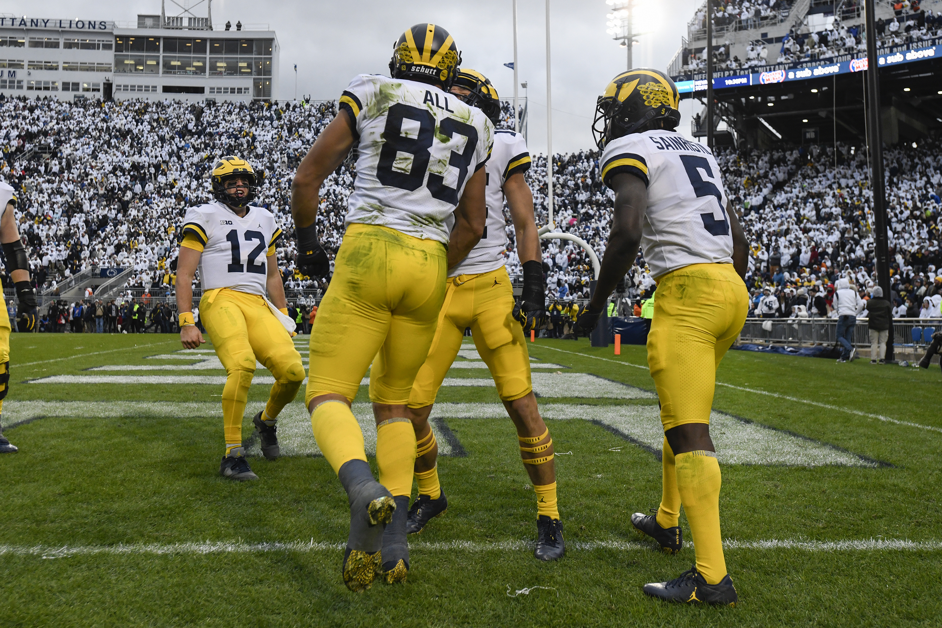 FILE Erick All, Cade McNamara, Mike Sainristil Michigan Penn St Football