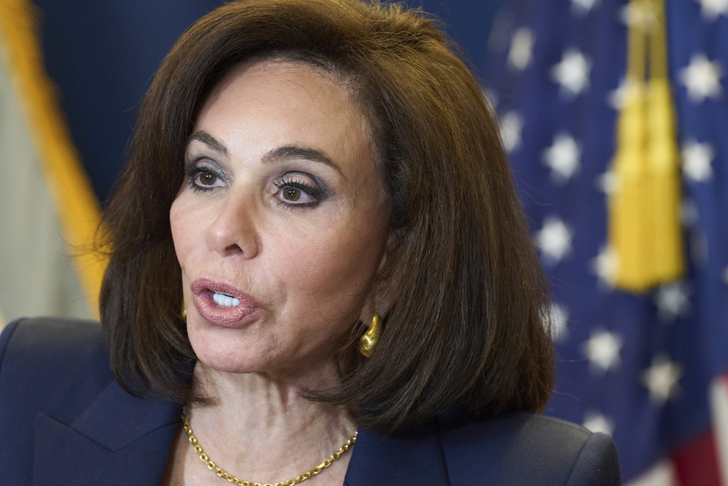 U.S. Attorney for the District of Columbia Jeanine Pirro speaks during a newss conference first about the indictment of an alleged Haitian gang leader and then about murders in Washington in 2024 and 2025, Tuesday, Aug. 12, 2025, at the U.S. Attorney's office in Washington.