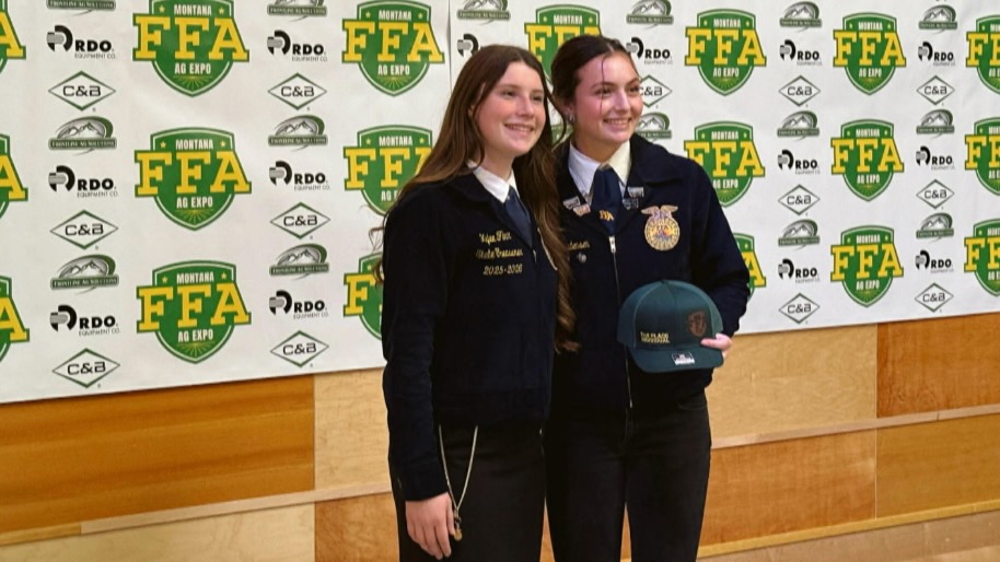 Kara Christensen (Right) posing at an FFA expo