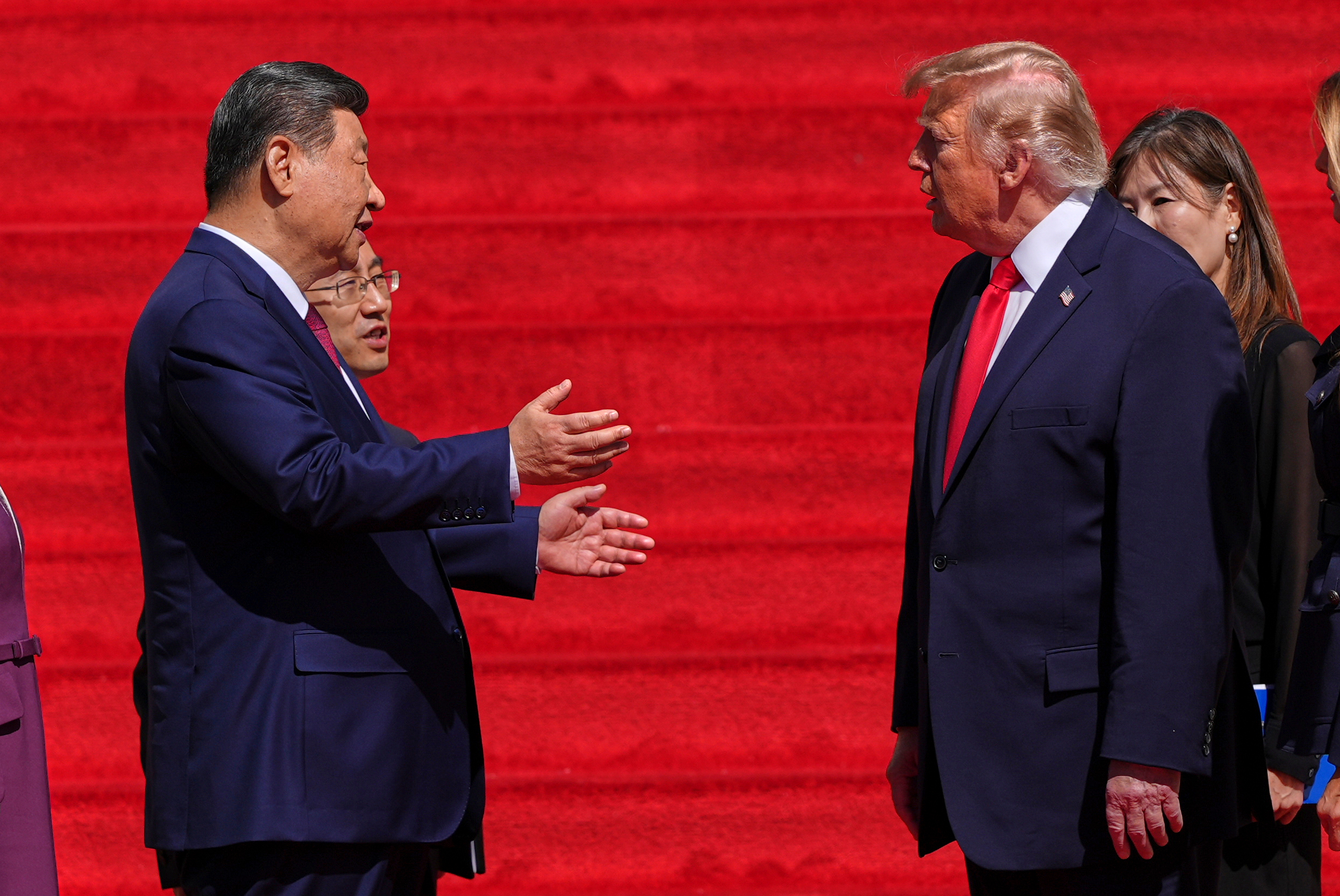 China's President Xi Jinping, left, speaks with President Donald Trump on the steps of the National Archives Museum, Friday, Sept. 25, 2026, in Washington.