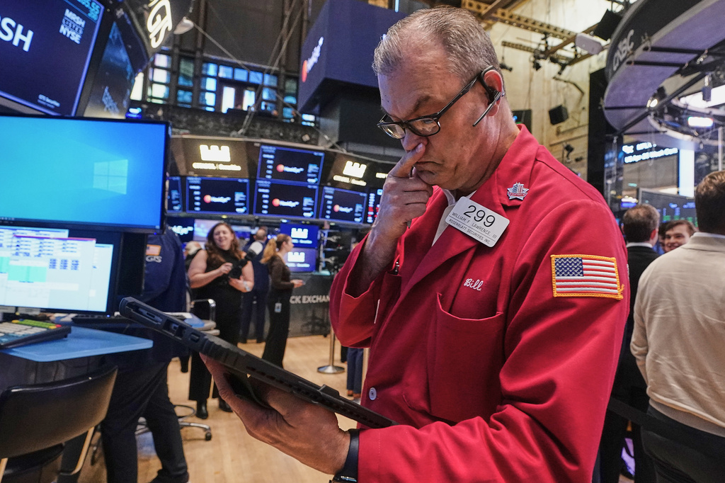Trader William Lawrence works on the floor of the New York Stock Exchange, Thursday, May 7, 2026.