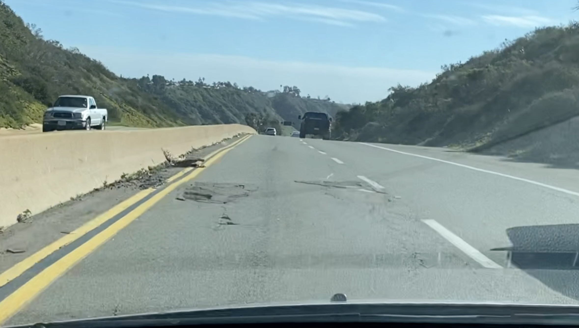 Potholes on La Jolla road lead to costly tire bill for Tesla owner