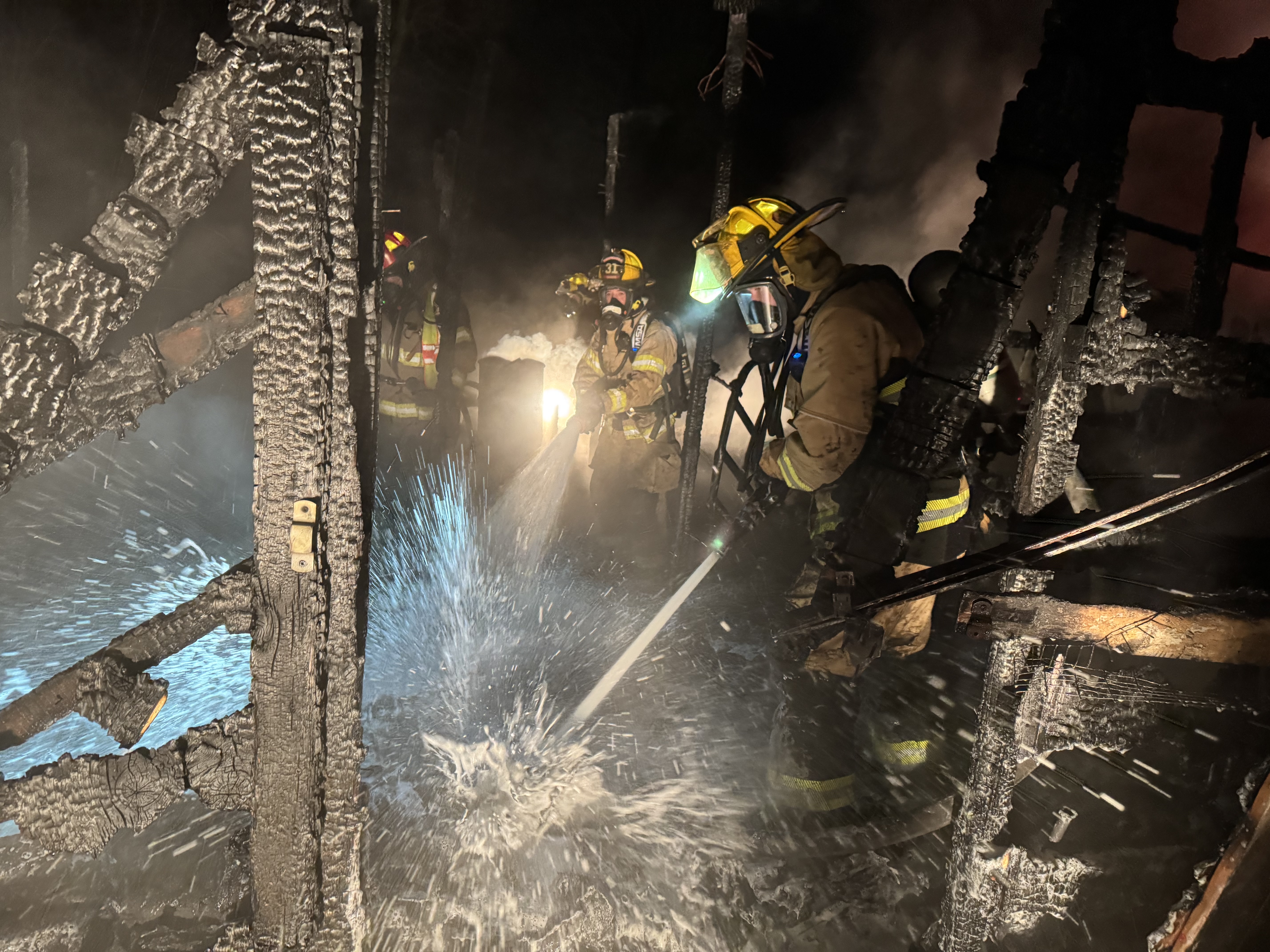 Hitting hotspots in burnt-out structure 2 - Casco Twp Fire