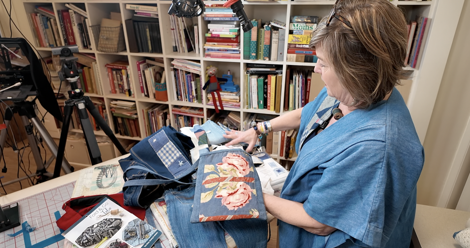 Amy Barickman shows off her panels in her studio
