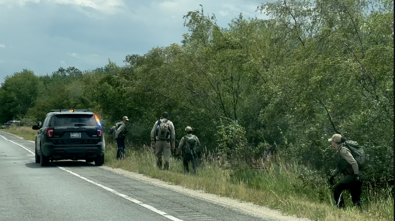 Manhunt continues for Anaconda man accused of killing four 