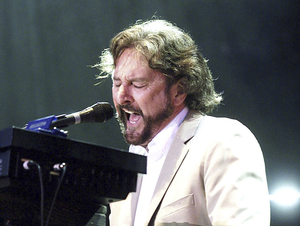 Rick Davies plays the keyboards while singing during the British band Supertramp's concert in Budapest, on Friday evening, June 28, 2002.
