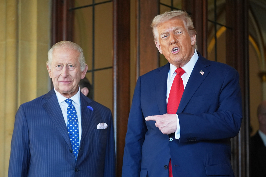 President Donald Trump gestures next to Britain's King Charles III before leaving Windsor Castle, Windsor, England, Sept. 18, 2025.