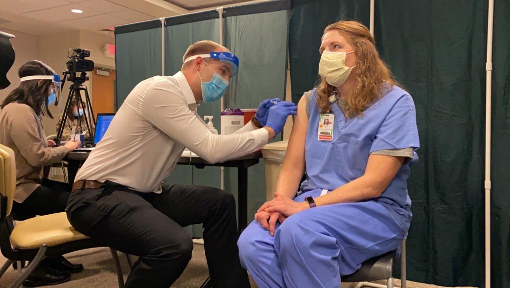  Julie Petre, a staff pharmacist for St. Peter’s Health in their ICU, received the first COVID-19 vaccine dose in Helena